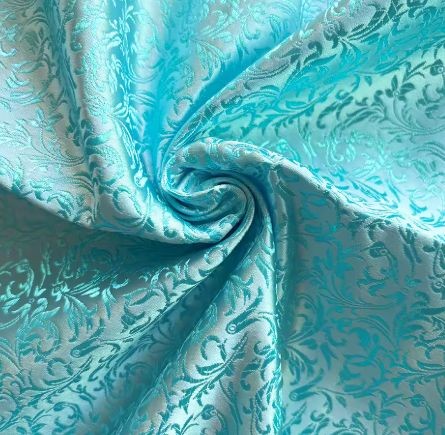 Light Blue Jacquard Fabric with a Delicate Flowing Pattern (note: width 28")
