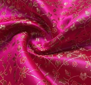 Fuschia Satin Brocade Fabric with a Delicate Flowing Pattern