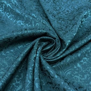 Teal Jacquard Fabric with a Delicate Flowing Pattern (note: width 59")
